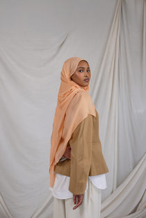 Golden Hour modal hijab by VELA, capturing the soft glow of evening light in a breathable summer weave.