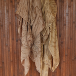 Two Mocha Dunes side by side to showcase hand-dyeing variation on a wooden background