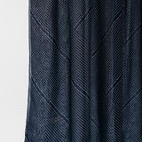Dark blue textured fabric on a white background