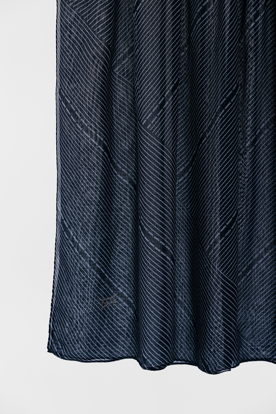 Dark blue textured fabric on a white background