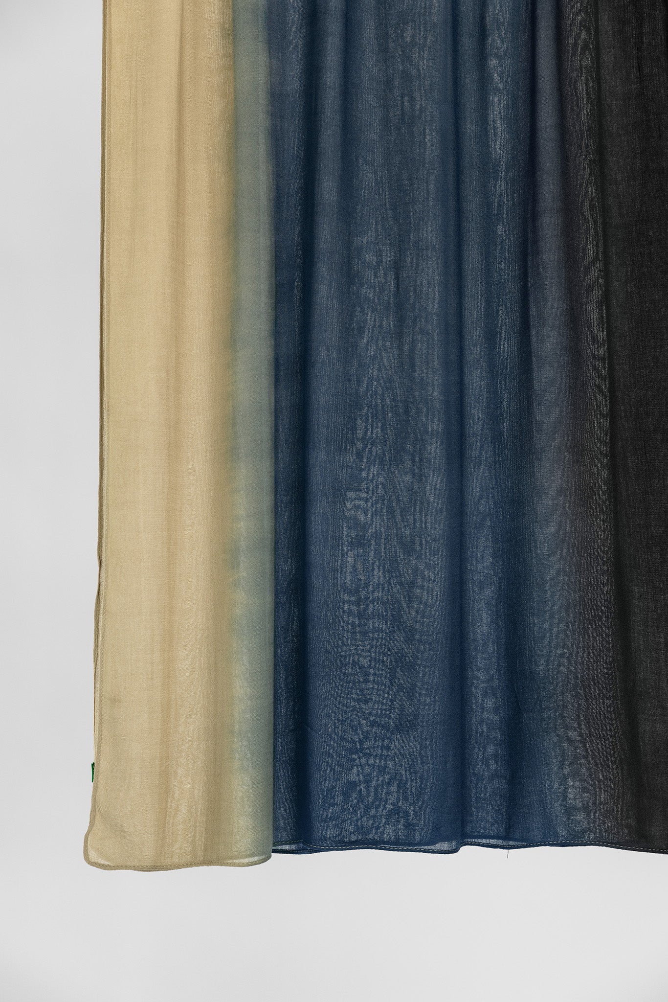 ombre blue fabric swatch on a white background