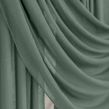 Close-up of green hijab fabric with folds