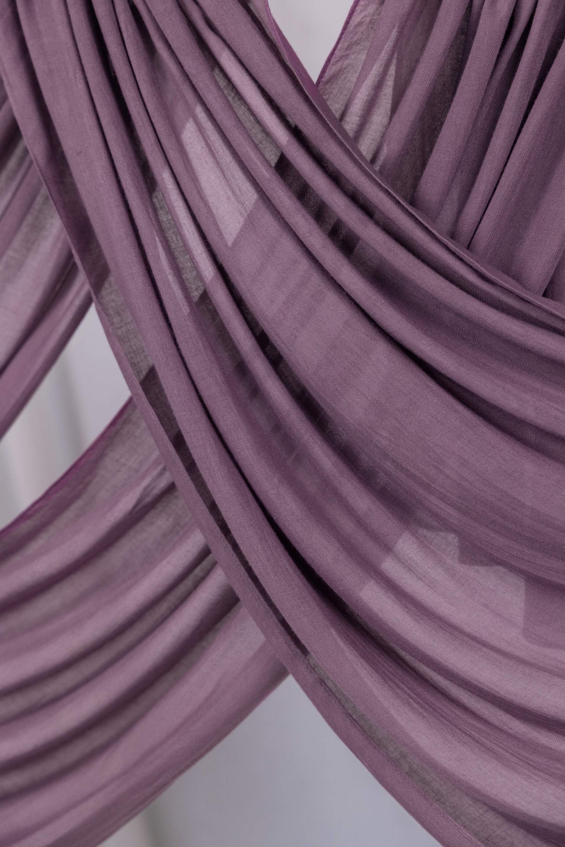 Close-up of purple fabric with a blurred background