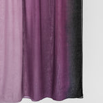 Ombre scarf transitioning from purple to black on a white background