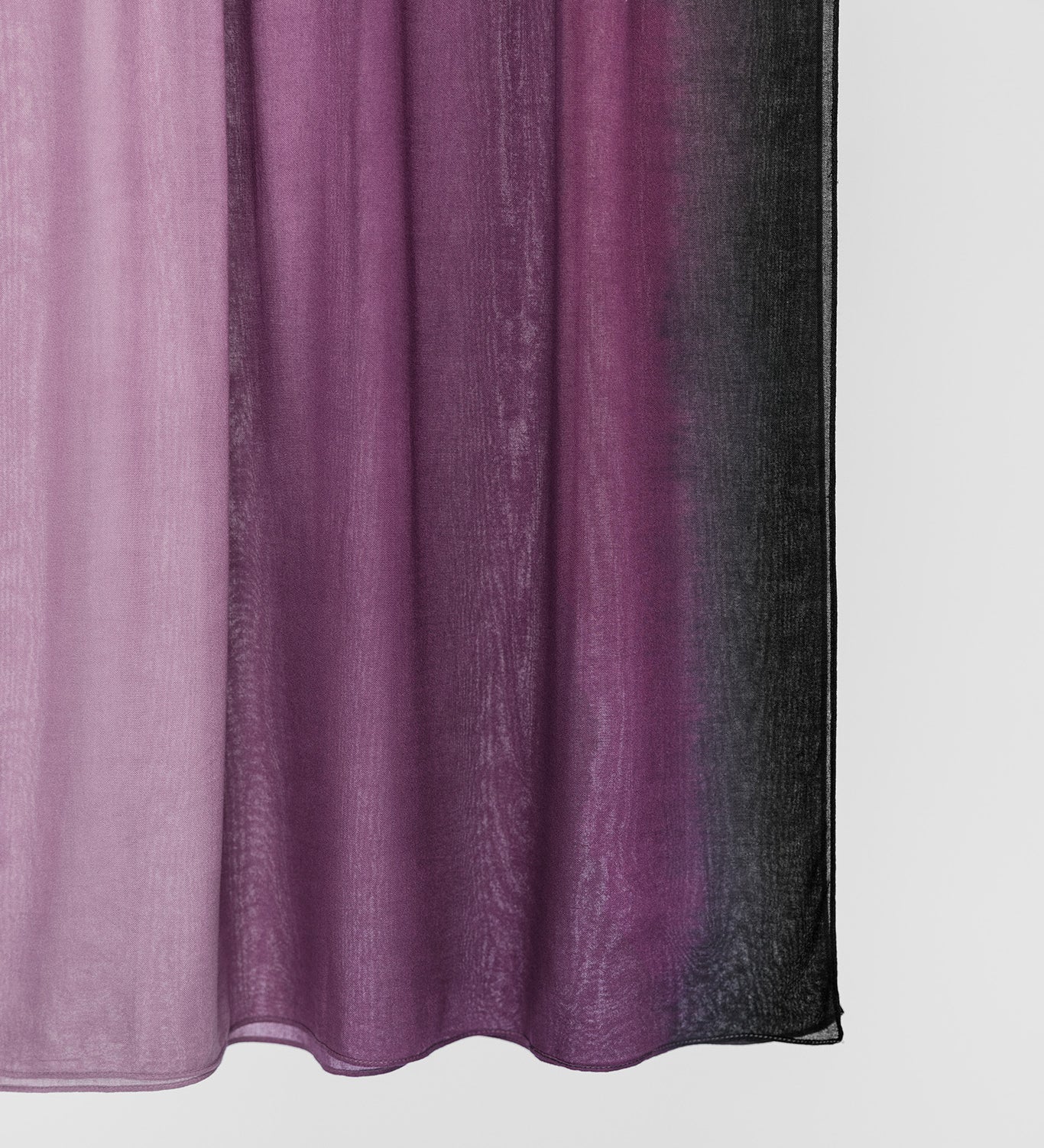 Ombre scarf transitioning from purple to black on a white background