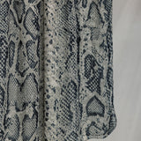 Product shot of Ink Cobra, that displays the snakeskin pattern and white, grey and black tones in the design. 
