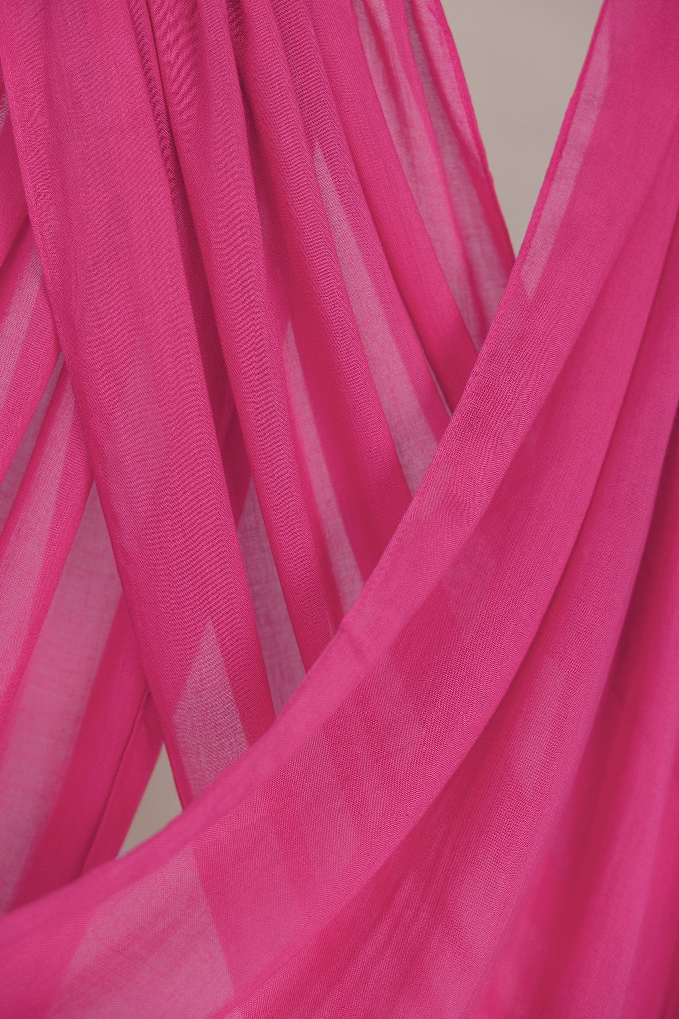 Close-up product shot of Rose Wave that shows the pink color and drape of fabric. 
