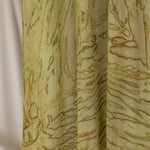 Olive printed hijab with a dune pattern on a plain background