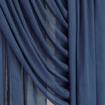 Close-up of blue hijab fabric with draped layers