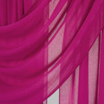 Close-up of pink fabric with a draped effect