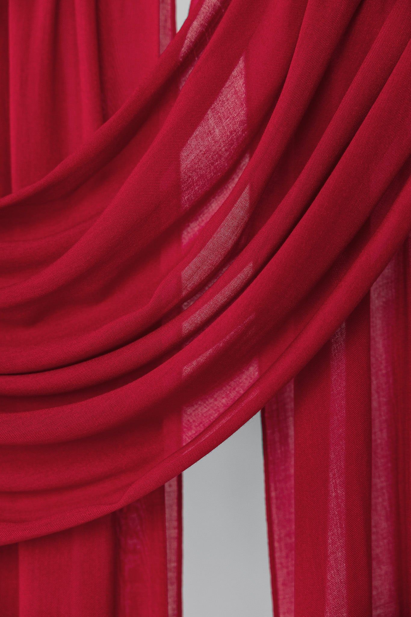 Close-up of red fabric with folds