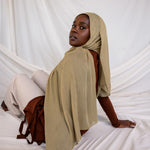 Model shot with model wearing Sandalwood, an earthy tan color by VELA.