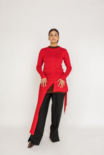 Loose-fit top designed for layering, with a flowing high-low silhouette