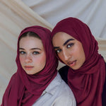 women wearing scarves