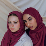 women wearing scarves