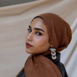 woman wearing maple sugar scarf