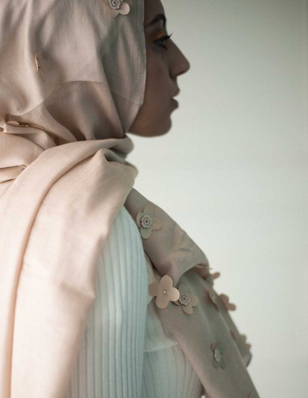 woman wearing platinum flower petal hijb